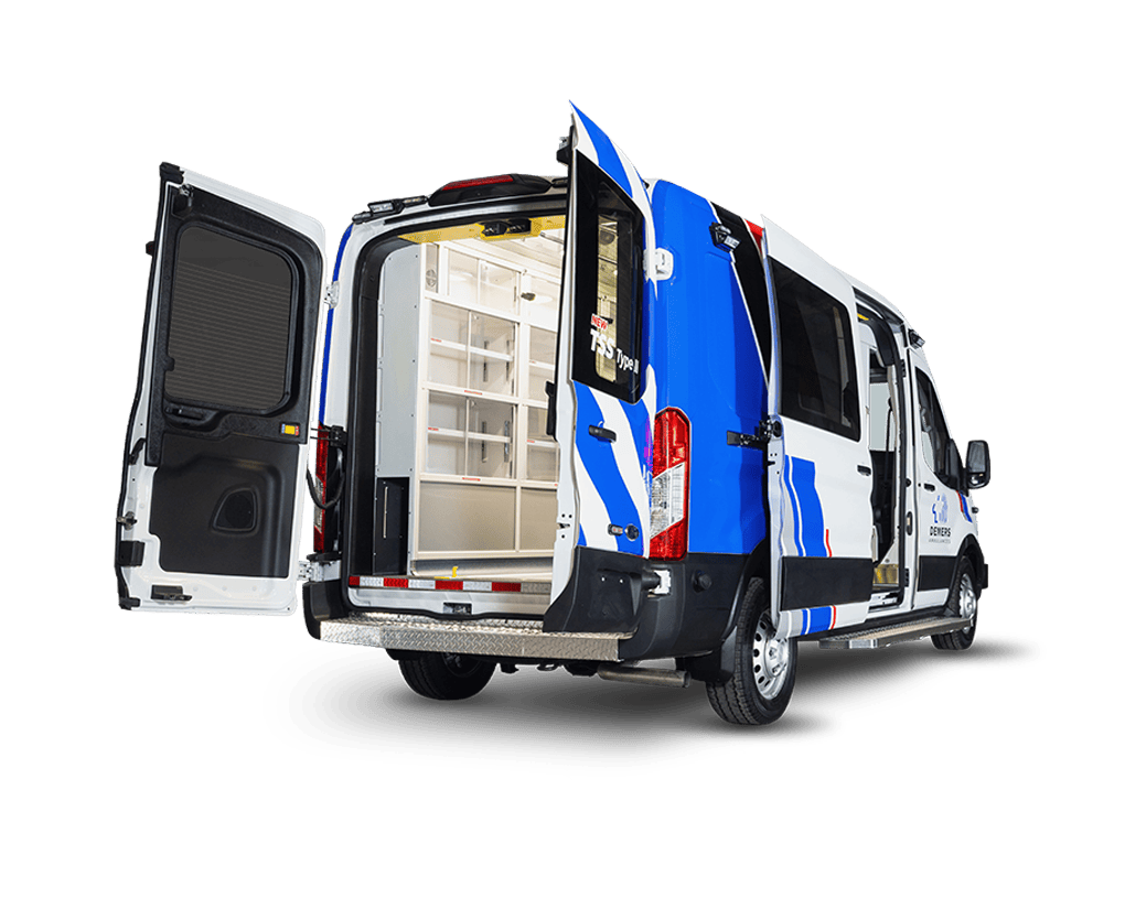 Shot from the rear of the ambulance van, model Transit TSS, showing the interior of the van with cabinetry and more inside the ambulance.