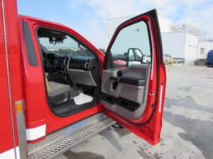 Glove holders in cab doors